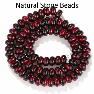 Detail view of 5x8mm dark red abacus-shaped tiger eye glass beads for DIY