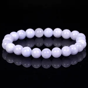 Elegant lavender chalcedony crystal beaded bracelet on a reflective black background
