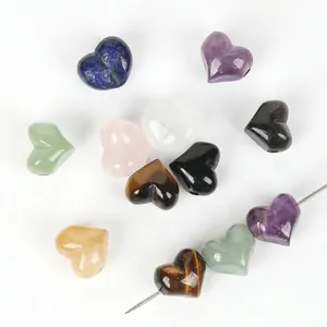 Detailed macro view of 13mm colorful heart-shaped natural stone beads for DIY jewelry