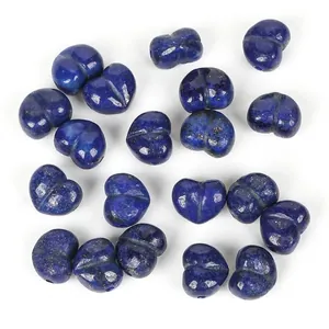 Close-up detail of 13mm heart-shaped natural blue lapis lazuli loose beads for DIY jewelry