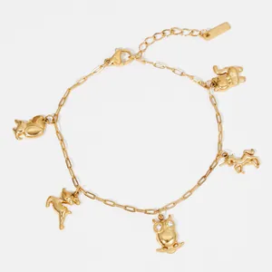 Golden stainless steel bracelet featuring diverse animal charms like owl and unicorn.