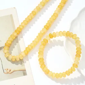 Conjunto de collar y pulsera de cristal amarillo natural con cuentas disco de moda