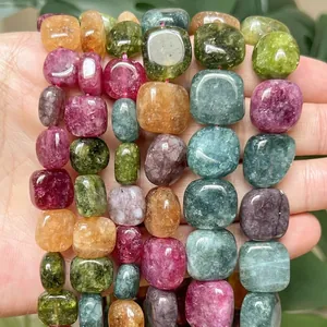 Close-up of colorful tourmaline chalcedony rectangular flat beads for DIY jewelry making