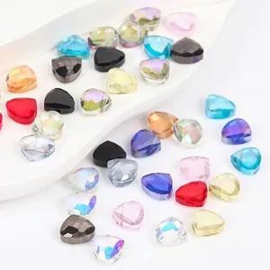 Close-up macro detail showing colorful 9x11mm triangular faceted crystal glass beads