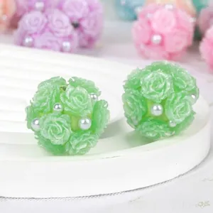 Detail of green clay rose flower ball beads with white pearls for DIY jewelry