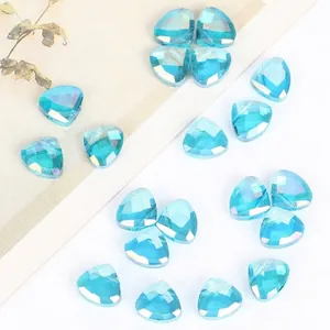 Close-up detail of 9x11mm faceted triangle blue crystal beads for jewelry making