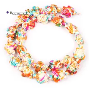 Close-up of colorful turtle-shaped synthetic turquoise beads for DIY jewelry