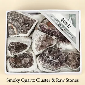 Natural smoky quartz cluster mineral raw stones in a white gift box for aromatherapy.
