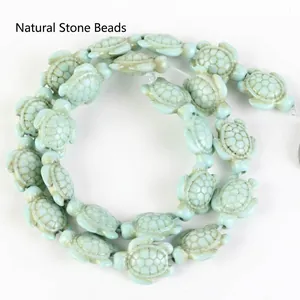 Detail shot of light blue synthetic turquoise turtle beads for DIY jewelry making