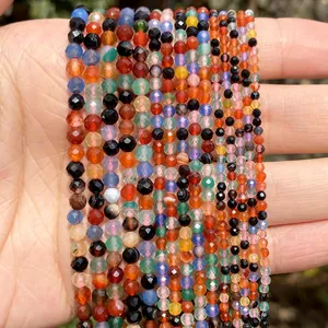 Close-up of 2mm-4mm faceted colorful natural stone beads for DIY jewelry making.