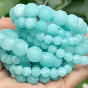 Detailed macro view of frosted light blue amazonite stone beads for DIY jewelry making