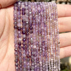 Close-up of small purple faceted amethyst beads for DIY jewelry making accessories