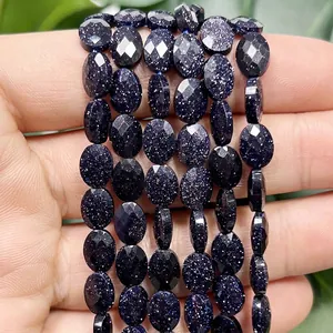 Macro detail of 6x8mm faceted flat oval blue goldstone beads for jewelry DIY making