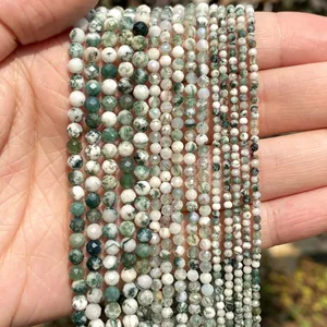 Macro view of 2mm to 4mm faceted moss agate natural stone beads for DIY jewelry