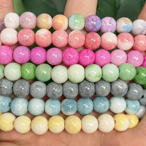 Macro view of colorful crackle glass beads for DIY jewelry making and bracelets