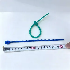 Detailed view of 21cm colorful thickened silicone cable ties next to a measuring tape