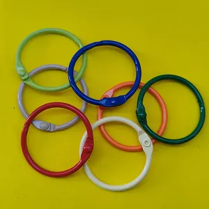 Detail showing a variety of colorful 30mm painted metal binder rings for DIY crafts