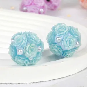 Detailed view of light blue clay rose flower ball beads with pearls for DIY jewelry