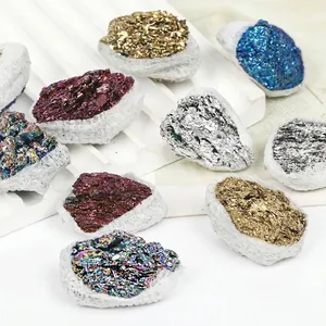 Close-up detail of various mixed color electroplated raw mineral stones and coal crystals