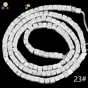 Detailed view of 2x2mm white natural stone square spacer beads for DIY jewelry making