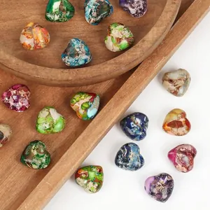 Detail view of 15mm heart-shaped multi-color Imperial Turquoise Jasper beads