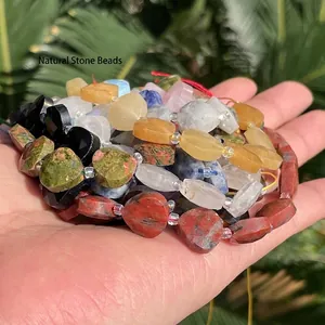 Macro detail of multi-colored faceted teardrop natural stone beads for DIY jewelry making