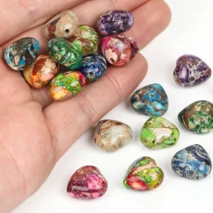 Detailed view of colorful 15mm heart-shaped Emperor Turquoise beads for DIY jewelry making