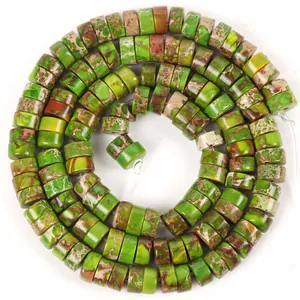 Macro view of green imperial jasper 6x3mm natural stone spacer beads for jewelry