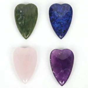 Set of four natural heart-shaped polished stones for jewelry DIY making and crafts.