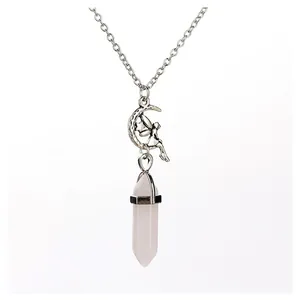 Detail of a silver necklace featuring a moon fairy pendant with a rose quartz crystal point.