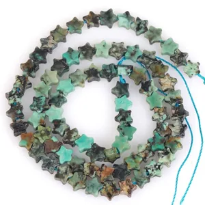 Macro view of 6mm star-shaped natural African Turquoise stone beads for jewelry making