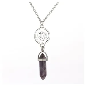 Close-up of a natural amethyst crystal pendant with a hollow lotus flower design