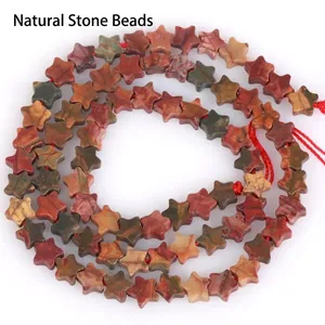 Macro detail of 6mm star-shaped natural stone beads with red cord for DIY jewelry making