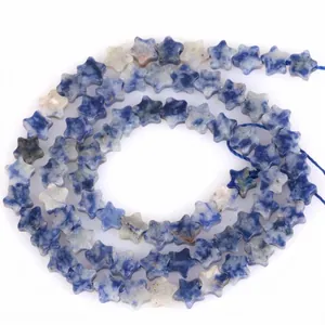 Macro view of blue sodalite natural stone star-shaped beads for DIY jewelry making