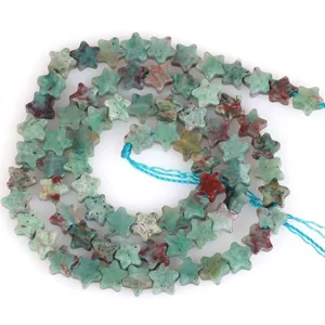 Close-up of 6mm star-shaped green aventurine natural stone beads for DIY jewelry