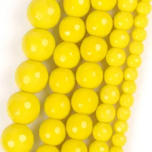 Macro view of yellow faceted natural stone beads for DIY jewelry making