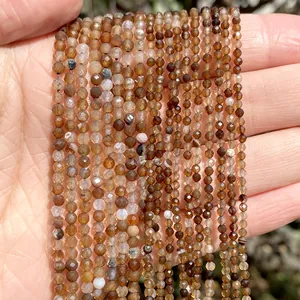 Macro view of small faceted natural stone beads for DIY jewelry making and crafts.