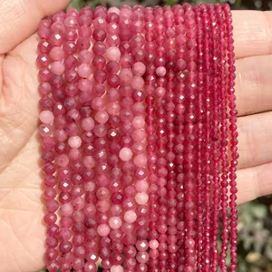 Close-up of faceted pink natural stone beads in 2mm, 3mm, and 4mm sizes for DIY