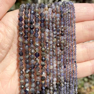 Close-up of faceted natural iolite beads in 2mm, 3mm, and 4mm for DIY jewelry making