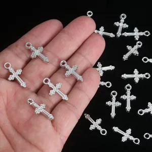 Detailed close-up view of silver cross pendants for DIY jewelry and bracelet making