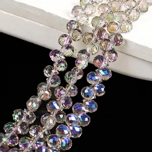 Detailed macro shot of 6mm iridescent faceted crystal beads for DIY jewelry craft projects.
