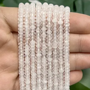 Detalle de cuentas espaciadoras ábaco de piedra natural de 2x4mm para joyería DIY