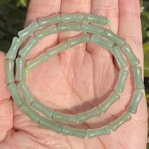 Macro view of 5x12mm natural green bamboo-joint jade beads for DIY jewelry making accessories