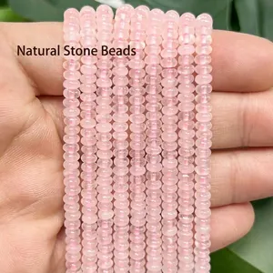 Primer plano de cuentas de ábaco de piedra natural rosa claro 2x4mm para joyería DIY