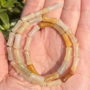 Close-up of natural bamboo-joint chalcedony beads with a smooth texture for DIY