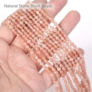 Close-up of 4mm faceted peach natural stone beads for DIY jewelry making