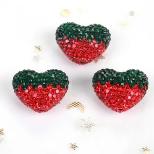 Detailed view of strawberry-shaped heart rhinestone Shamballa beads for DIY jewelry
