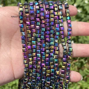 Close-up of faceted square iridescent glass beads for DIY jewelry making material