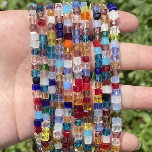 Close-up view of colorful faceted square crystal glass beads for DIY jewelry making