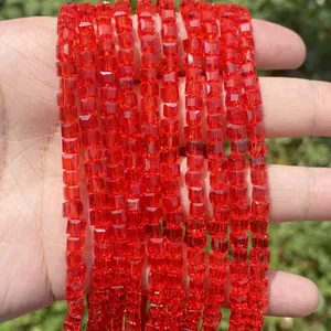 Close-up of faceted red cube crystal glass beads for DIY jewelry making accessories